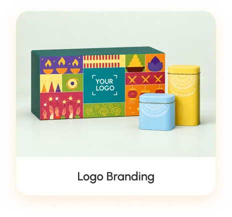 A long Diwali-printed gift box with a “Your logo” panel set into the artwork, beside a blue and a yellow printed tin