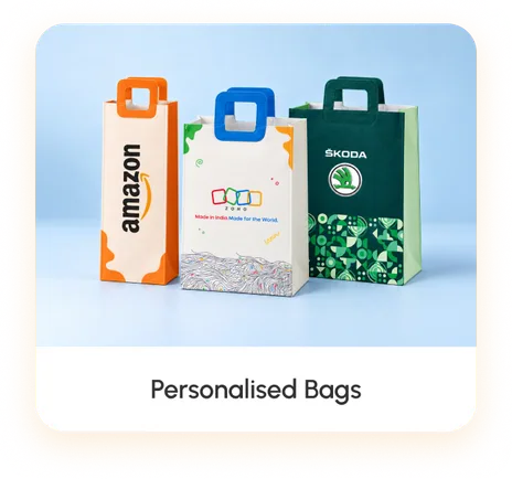 Three printed paper carry bags with moulded handles, each in a different client's colours