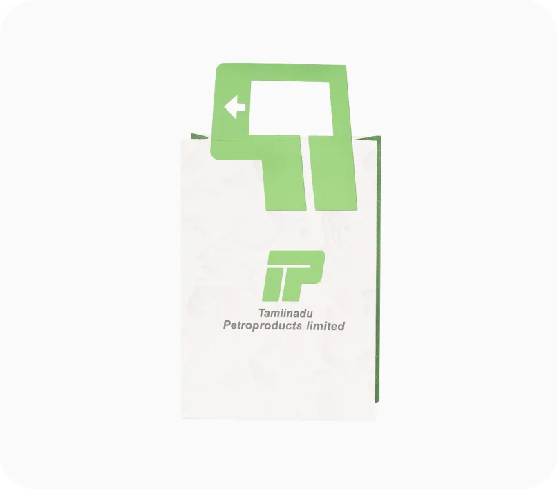 A white carry bag with a die-cut green handle printed for Tamilnadu Petroproducts